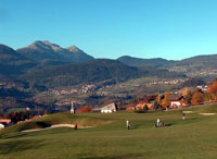 Panoramic view of the Val di Non with the Luc peak and the towns of Fondo and Malosco